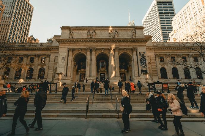 people walking near New York Public library during daytime